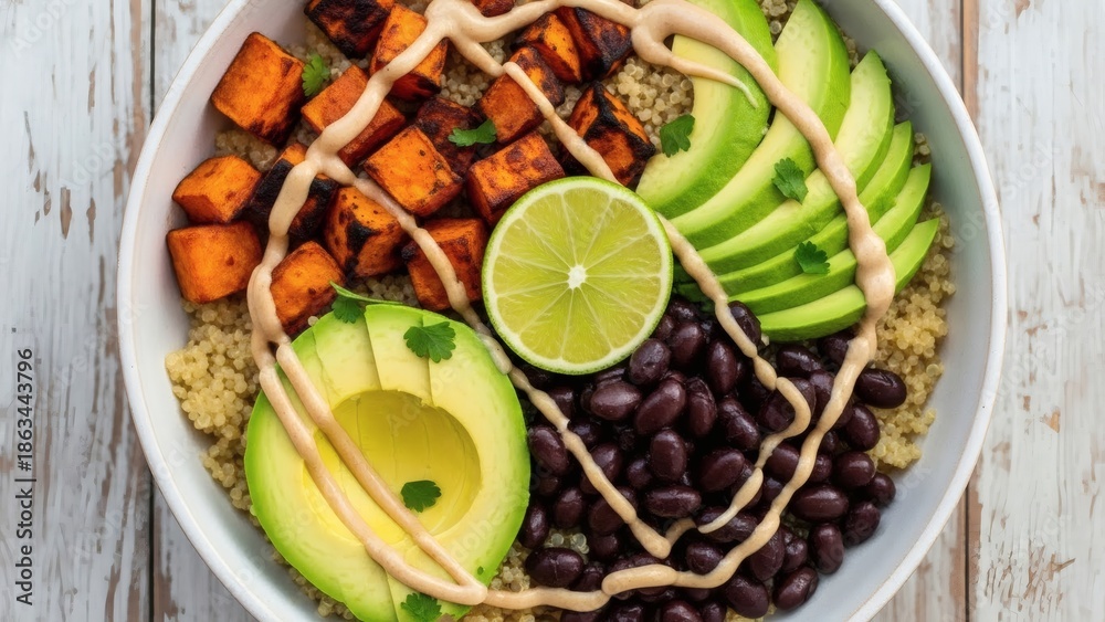custom made wallpaper toronto digitalDelicious bowl of food with sweet potatoes, avocado, lime, black beans, and sauce on a rustic wooden table background
