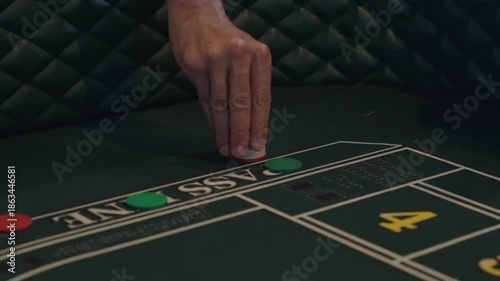 Close Up of Hands At Casino Craps Table Placing Bet