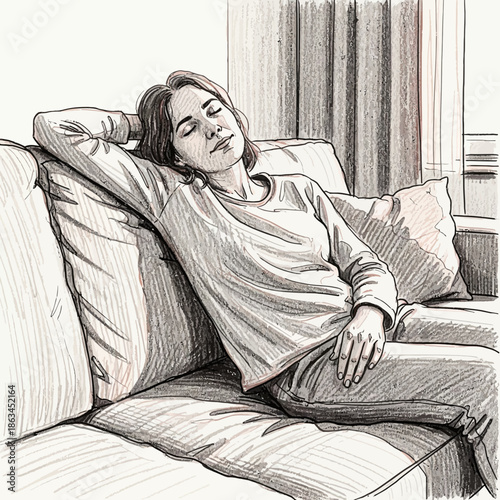 Woman resting on sofa, eyes closed, enjoying peaceful moment at home