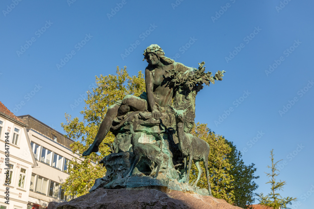 Obraz premium Donop fountain in Detmold at market square by artist Meister Hölbe in 1902.