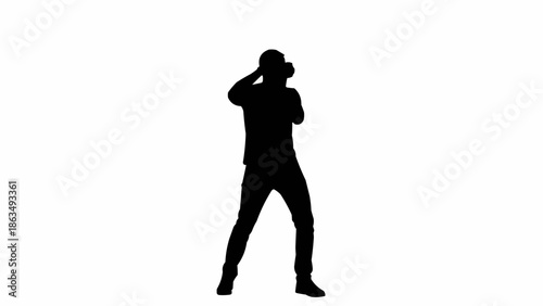 Silhouette of a boxer throwing a punch in a fighting stance.