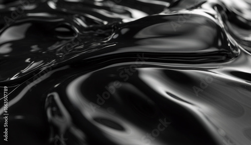 Luxurious abstract background of thick, glossy black liquid or crude oil