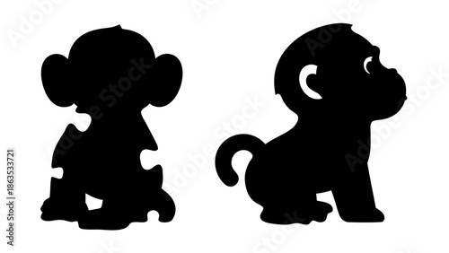 Two puzzle monkeys in black silhouette on white background
