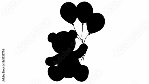 Silhouette of cute teddy bear holding heart shaped balloons