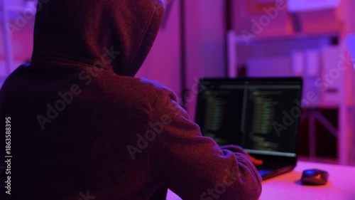 Hacker scammer coding trojan or computer virus to hacking security system break secret organization system. 