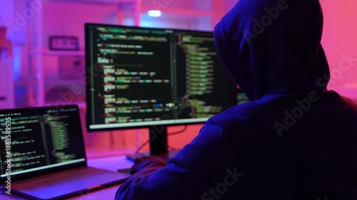 Hacker scammer coding trojan or computer virus to hacking security system break secret organization system. 