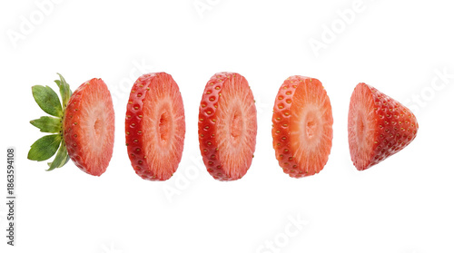 sliced strawberry floating on isolated transparent background 