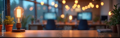 Wallpaper Mural Vintage Edison bulb illuminates modern office interior with blurred desks, chairs, and computers. Soft ambient lights create a warm, inviting atmosphere. Plants add touch of nature to workspace. Torontodigital.ca