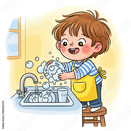 Happy young boy washing dishes in kitchen sink with soap bubbles