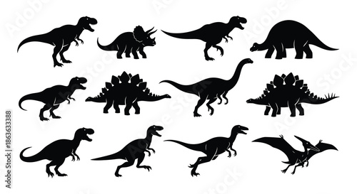 Silhouettes of various prehistoric dinosaurs including tyrannosaurus rex and pterodactyl