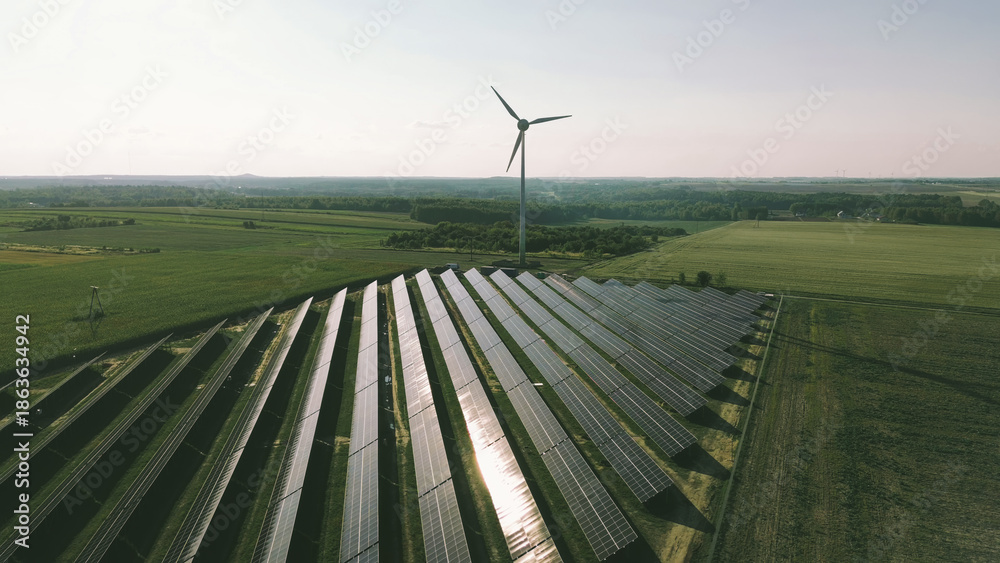 Φωτογραφία Wind turbine and solar panels generating clean power