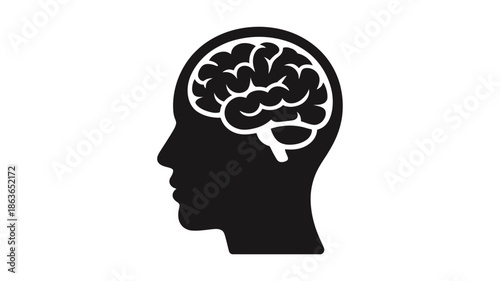 Human head silhouette showcasing a detailed brain inside black and white