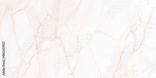 Elegant beige and gold marble texture creates a luxurious background showcasing natural veining and subtle patterns