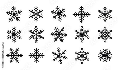 Set of fifteen decorative snowflakes, unique designs for winter holidays, and seasonal decorations.