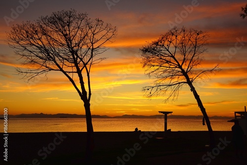A colorful sunset on the shore of Glyfada, Greece	