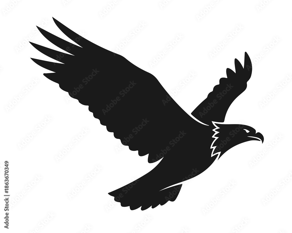 Obraz premium A black silhouette of an eagle in flight against a white background