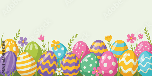 A cheerful array of beautifully decorated Easter eggs resting in vibrant green grass amidst tiny blossoms