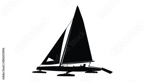 A striking silhouette of a catamaran sailboat gliding across the water showcasing its sleek design and nautical prowess