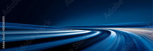 Futuristic blue light trails with high speed motion blur on dark background