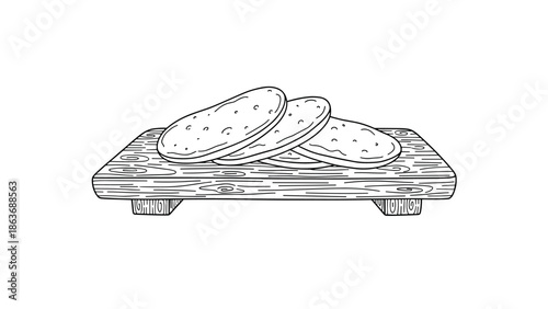 Hand drawn bread on rustic wooden board in black and white