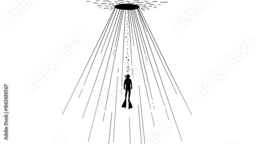 Silhouette of a diver surrounded by beams of light underwater adventure