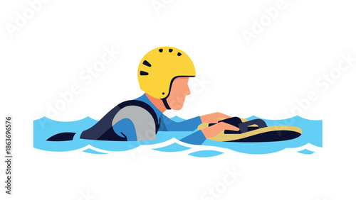 Man surfing waves on bodyboard wearing helmet