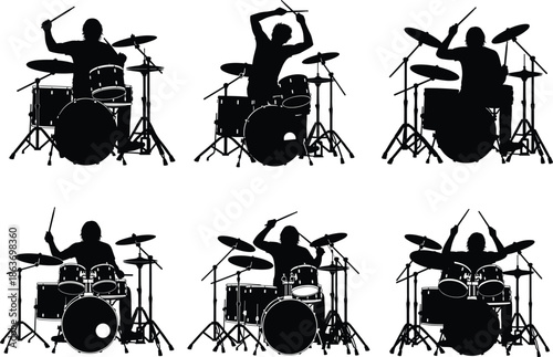 Silhouettes of Drummers in Rhythmic Action