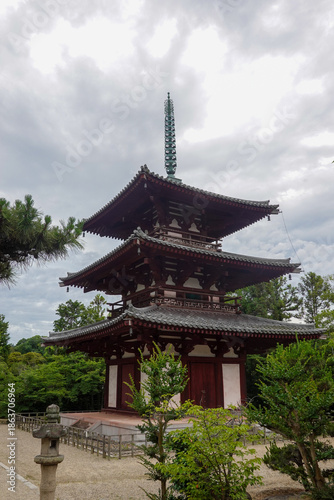 Wallpaper Mural Timeless close view of wooden temple building beside forest paths Torontodigital.ca