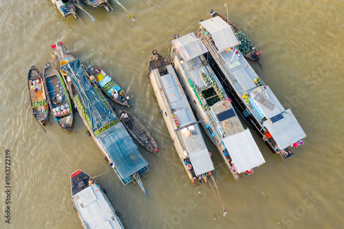 Canvas Print Overhead view shows a cluster of vendor boats loaded with fresh fruits and vegetables at Cai Rang floating market in Can Tho, Mekong Delta, southern Vietnam