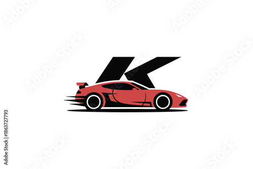 A sleek red sports car with a large black letter K speeding across a white background