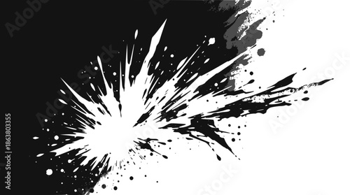 A black abstract ink splash or explosion with sharp, fragmented edges on a white background, creating a dynamic visual.