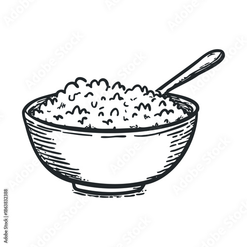 Bowl of cooked rice with spoon served for meal preparation