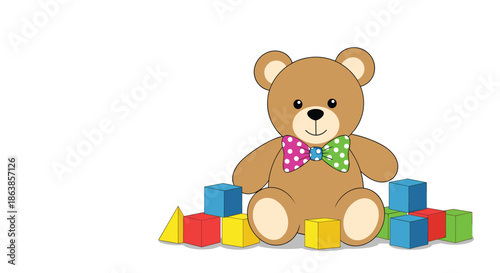 Classic brown teddy bear wearing a vibrant polka dot bowtie sitting on the floor surrounded by various colorful toy blocks.