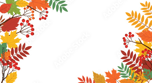 Autumnal background with a decorative frame of colorful fall leaves and red rowan berries creating a border with copy space.