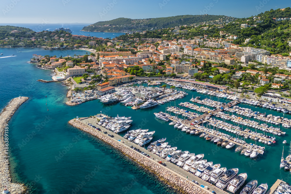 Fototapeta premium Aerial view of Beaulieu-sur-Mer, a resort town on the French Riviera coastline