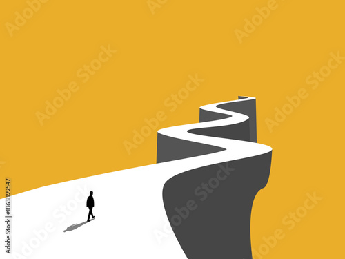 ambitious businessman walks the path on the hill.