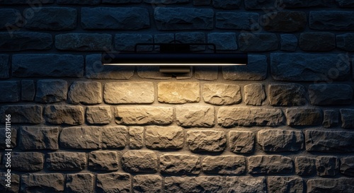 Warm light illuminates textured stone wall creating a cozy ambiance.