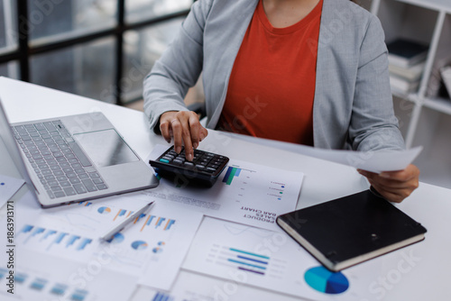 business woman Auditor or internal revenue service staff checking annual financial statements company Audit  Accounting tax
