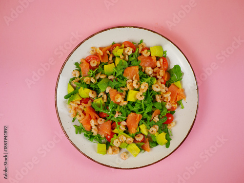 Wallpaper Mural Top view colorful salmon shrimp avocado arugula salad arranged neatly for a healthy step by step recipe illustration with balanced ingredients. pro photo Torontodigital.ca