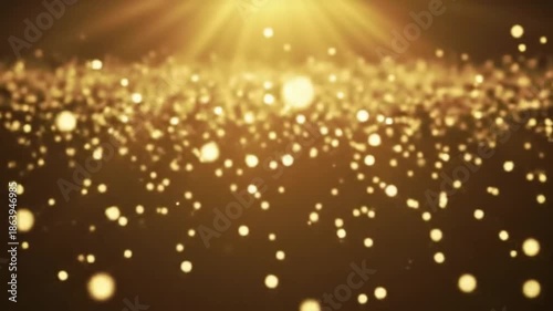 Abstract gold particles floating with light rays for elegant background