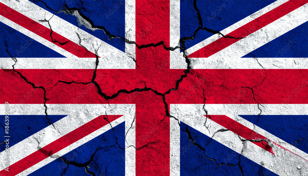 Fototapeta premium Cracked UK flag on concrete wall texture, distressed Union Jack background