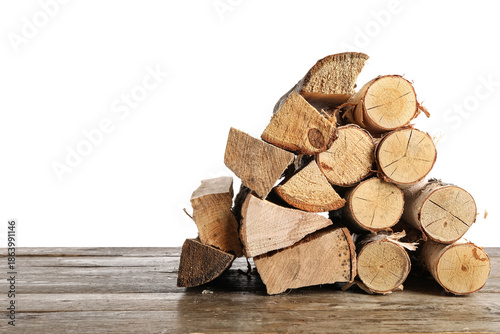 Stack of firewood on wooden...
