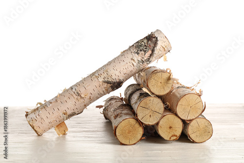 Birch logs on wooden table ...