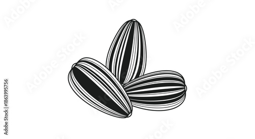 Set of three black and white striped sunflower seed icons illustrated with bold lines to emphasize their characteristic shape and pattern.