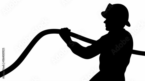 Firefighter in action with hose to combat flames effectively