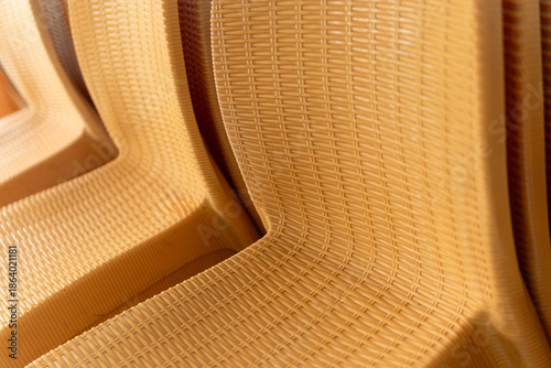Close Up of Woven Pattern Plastic Chairs
