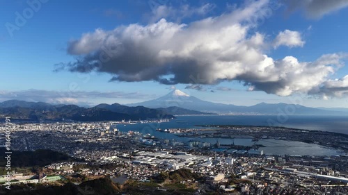 Lateral Drone Shot of Mount Fuji and Shimizu Port Overlooking Shizuoka City, Japan