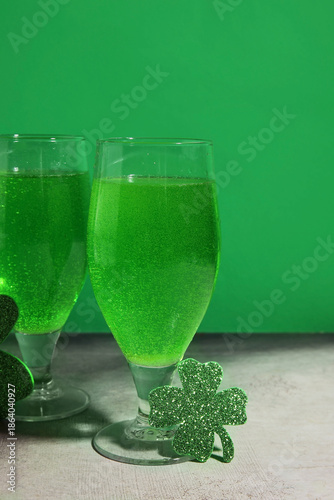 Glasses of beer and clover ...