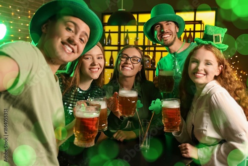 Group of young friends with...