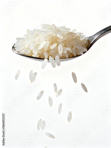 Floating Spoonful of Cooked Rice in Studio Light